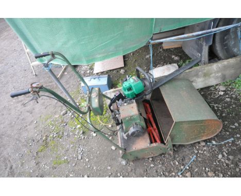 A VINTAGE ATCO PETROL CYLINDER MOWER with grass box ( engine pulls but with resistance and hasn't started) along with a Perfo