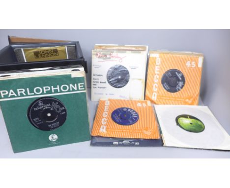 A collection of 45rpm records, Elvis, Rolling Stones and The Beatles, cased, 45 in total