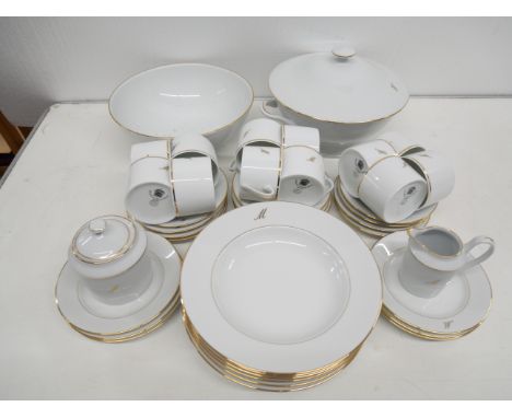 A Limoges France dinner service comprising of twelve coffee cups &amp; saucers, six small plates, sugar bowl &amp; milk jug, 