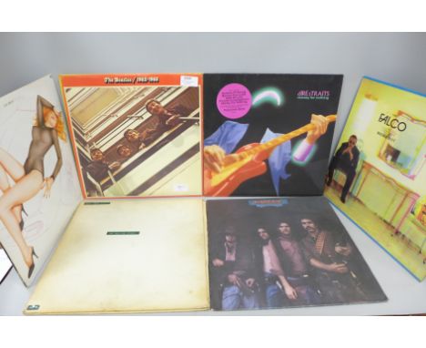 A collection of ten LPs, The Beatles, Rolling Stones, The Clash, The Stranglers, etc.