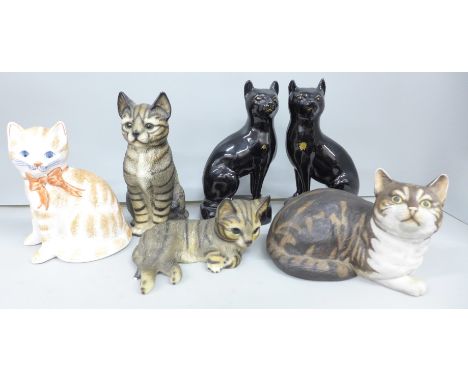 A pair of Victorian cat figures in black, a Rye pottery model cat and three others, (two a/f)