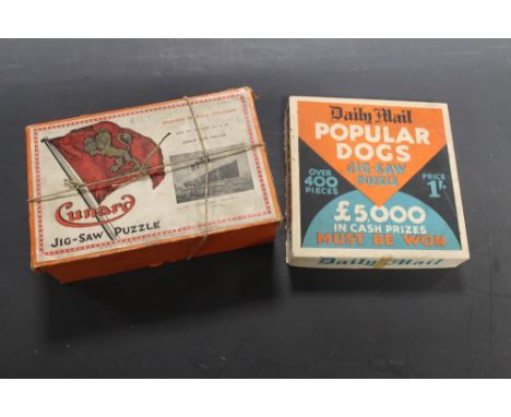 A BOXED CHAD VALLEY CUNARD WOODEN JIGSAW 'AQUITANIA', together with a boxed Daily Mail Popular Dogs card jigsaw