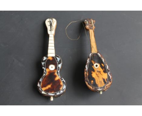 TWO TORTOISESHELL MINIATURE MUSICAL INSTRUMENTS, a guitar and a mandolin (2)  A/F