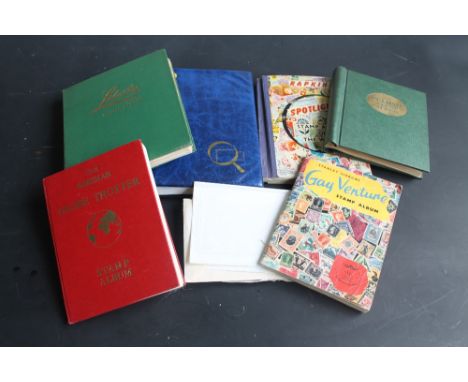 SIX ALBUMS OF VARIOUS WORLDWIDE STAMPS, together with a small quantity of first day covers