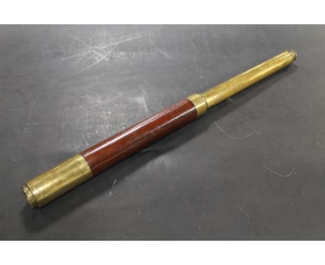 A 19TH CENTURY BRASS AND MAHOGANY SINGLE DRAWER TELESCOPE. Marked 'W Youles, 23 Fieldgate St London, Day or Knight'. Extends 