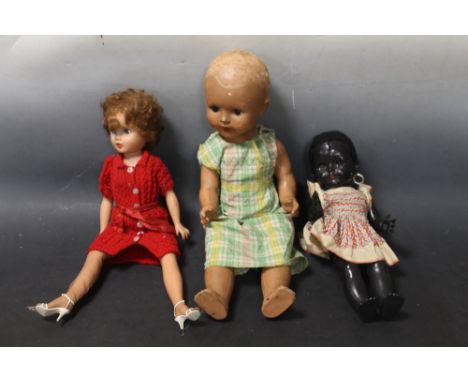 A PEDIGREE HARD PLASTIC DOLL WITH JOINTED BODY, a Chiltern soft vinyl doll, and another composition doll (3)