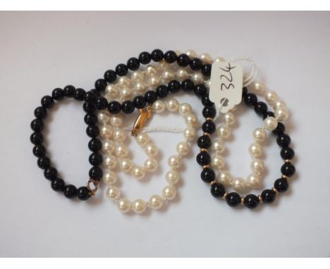 Pearl necklace with 9ct clasp 18" long, aslo   another         