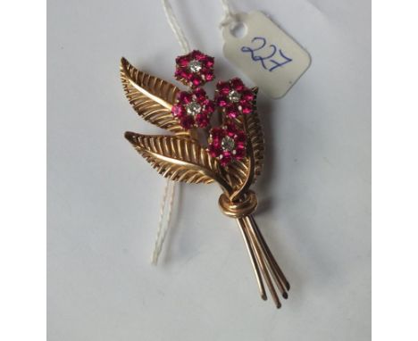 Large gold flower brooch mounted with  rubies and diamonds 16.2g inc     