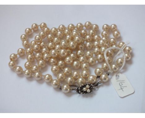 Pearl necklace with silver fastener 36” long    