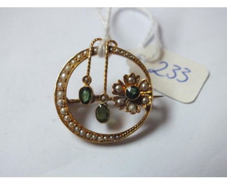 Circular gold mounted peridot  and pearl brooch 3.4g inc      