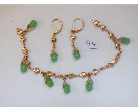 Gold ad jade bracelet with matching earrings   