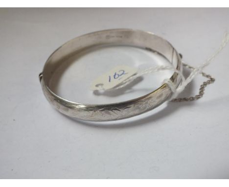 Slim engraved silver bangle      