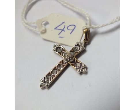 White and yellow gold cross set with diamonds  3.5cm long         