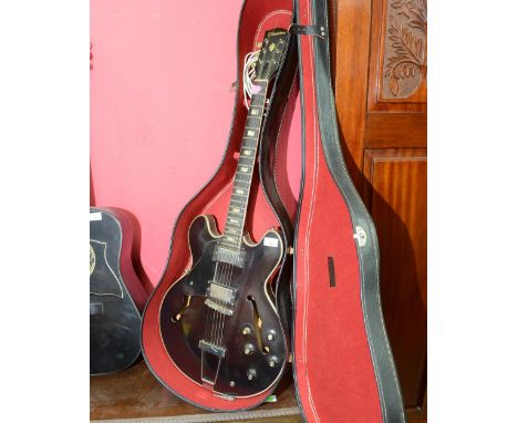 A vintage Columbus electric guitar in hard case