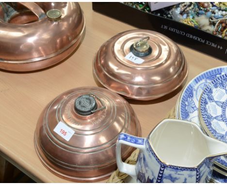 Two vintage copper hot water bottles