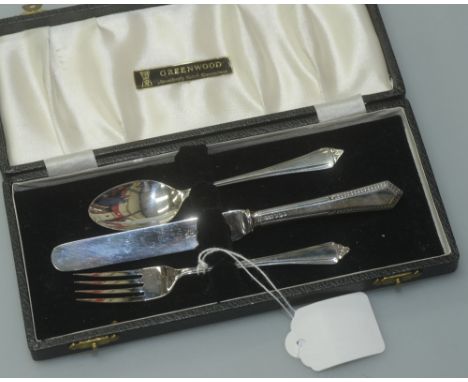 A cased James Dixon & Sons silver Christening set comprising: knife, fork and spoon, Sheffield 1960, 2.2 troy ounces