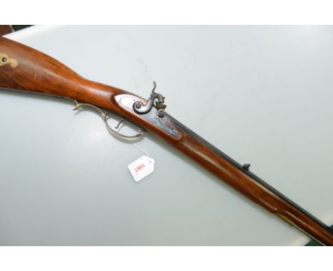 A 0.45 Spanish smooth bore Kentucky percussion musket with open sights, ram rod within full length stock, octagonal 35" barre