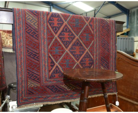 A tribal Gazak style carpet. 107x125