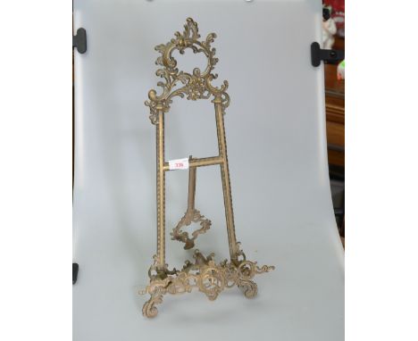 A Victorian brass table easel 