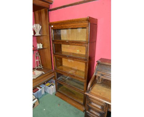 An early 20th century oak five tier Globe Wernicke style bookcase