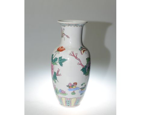 A Chinese porcelain famille rose enamel vase decorated with peonies and butterflies, height 31cm 