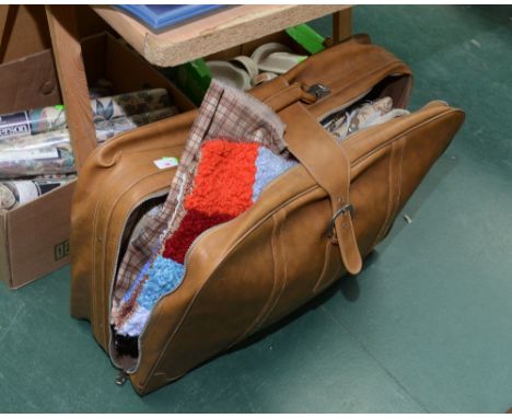 A vintage suitcase; tog. with curtains