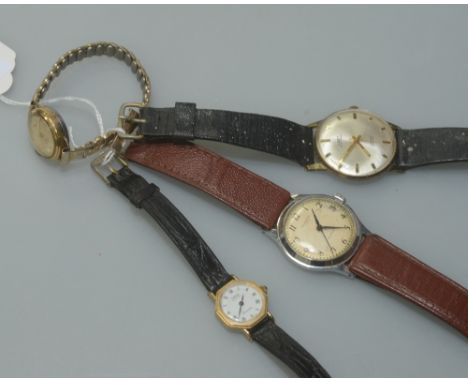 A group of four vintage wristwatches