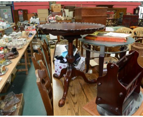 A 19th century mahogany tilt-top tripod table, the circular top with piecrust edge above a birdcage over a baluster standard,