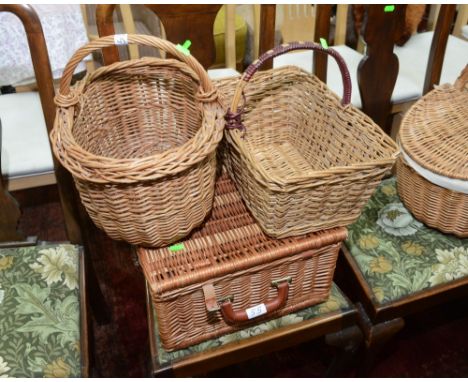 A wicker picnic hamper; tog. with two wicker handled baskets