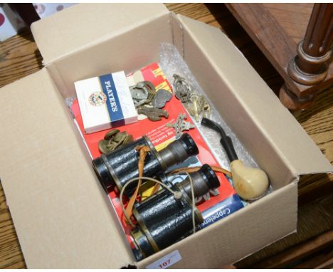 A box inc. World War II period Kershan Bino Prism No. 2 Mk III, reg no. 285349, a quantity of military badges and buttons, vi