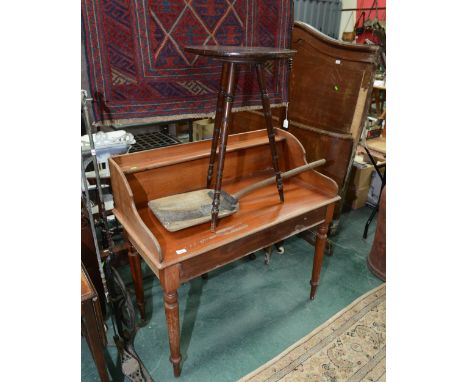 A mahogany writing desk; tog with a tripod occasional table