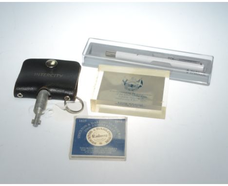 Railway interest: an Intercity train key, anniversary ticket, pen and paperweight