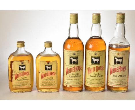 White Horse Scotch Whisky 1960s Bottling 26 2/3rds Fl Oz 70% proof 2 bts White Horse Scotch Whisky 1970s Bottling 26 2/3rds F