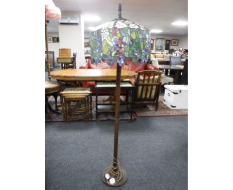 A Tiffany style standard lamp with shade 