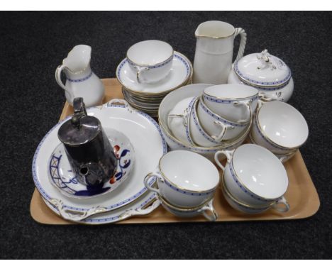 A tray of Victorian gilded tea china, silver plated teapot, etc 