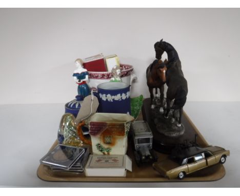 A tray of commemorative crowns, die cast vehicles, Royal Worcester figure, Wedgwood Jasper ware etc 