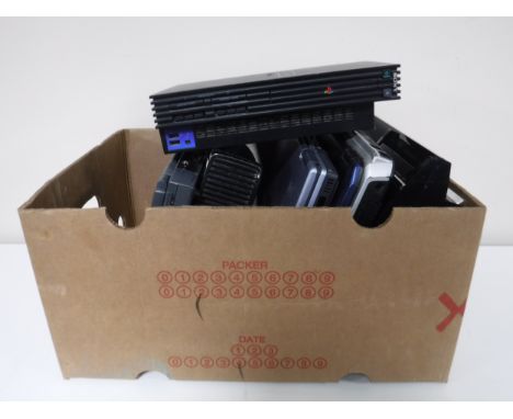 A box of three lap tops, a XBox 360 console, PS2 and a PS3 consoles 
