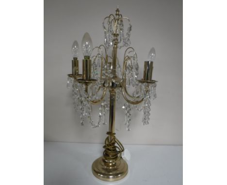 A brass five way decorative table lamp with glass drops 