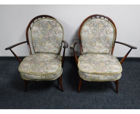 A pair of Ercol armchairs 