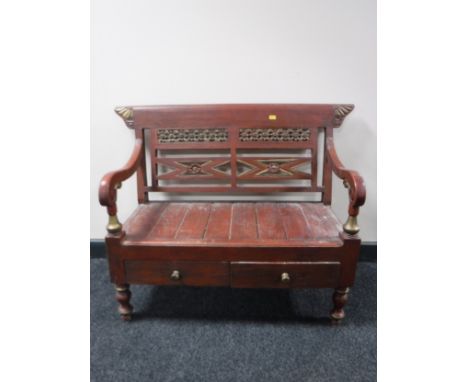 A Chinese style low bench fitted with two drawers 