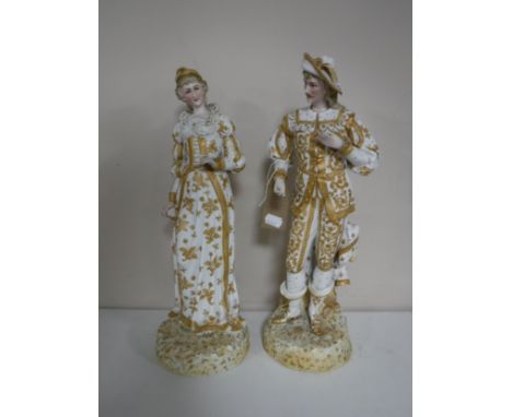 A pair of continental bisque figures of a lady and gentleman in white and gold dress.  CONDITION REPORT: Height 40cm. The mal