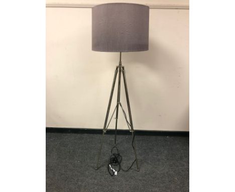 A contemporary rise and fall floor lamp