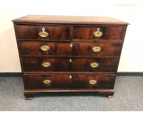 A George III mahogany five drawer chest on bracket feet, width 113cm