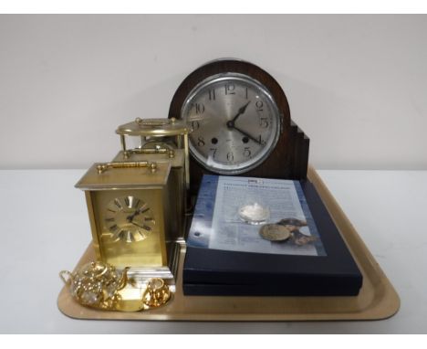 A tray of early 20th century oak cased mantel clock, three carriage clocks, Swarovski plated teapot and tea cup, a Battle of 