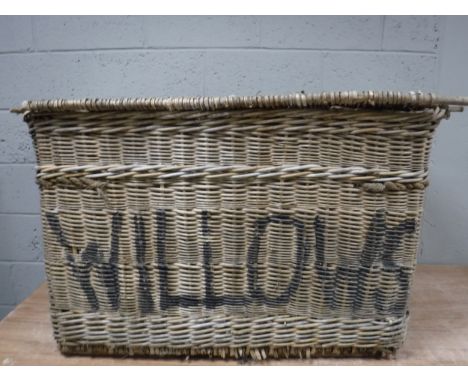 A large wicker laundry hamper 