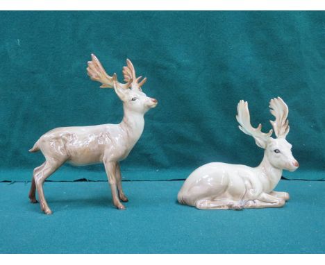 TWO BESWICK GLAZED CERAMIC REINDEERS 