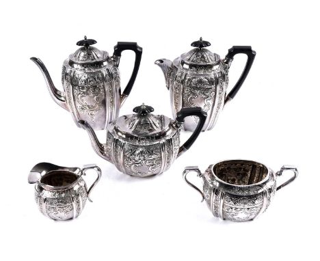 A silver plated tea and coffee service by Walker &amp; Hall, Sheffield, all with ornate floral decoration, comprising: a coff