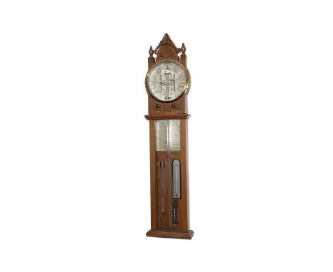 A 20th Century Torricelli carved oak Admiral Fitzroy barometer, 109cms high.