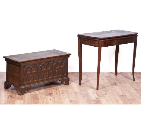 A Georgian style carved oak coffer, of small proportions, with hinged top above carved frieze, raised on bracket feet, 94 x 3