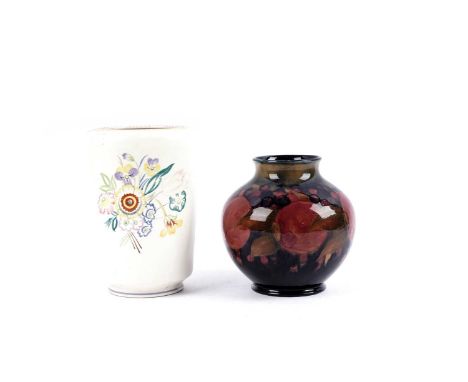 A Moorcroft 'Pomegranate' pattern vase, tubeline decorated with fruit on a mottled blue ground, painted and impressed marks t